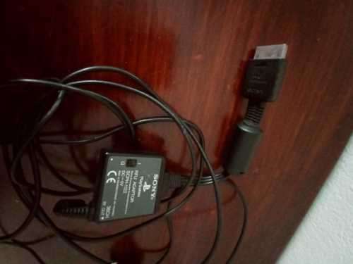 Old PS1 console with cables and 2 games(not tested)