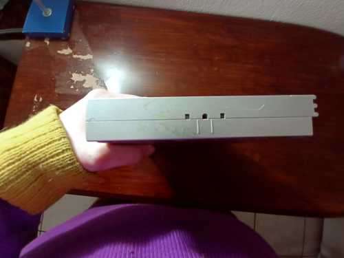 Old PS1 console with cables and 2 games(not tested)