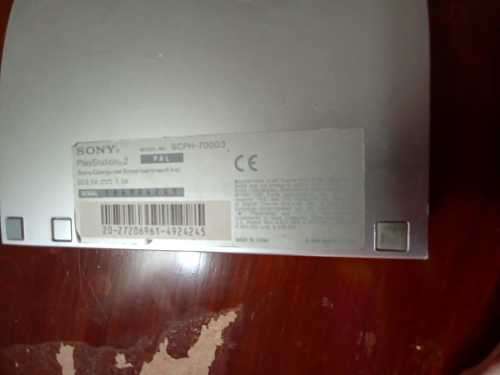 Old PS2 console with cable, manual and 9 games(not tested)