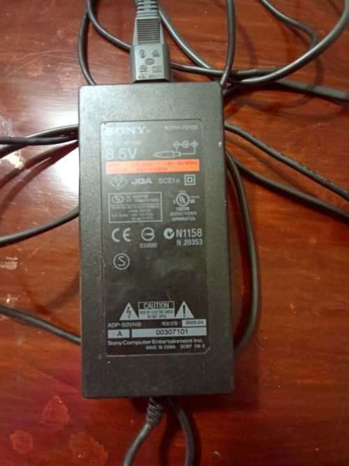 Old PS2 console with cable, manual and 9 games(not tested)