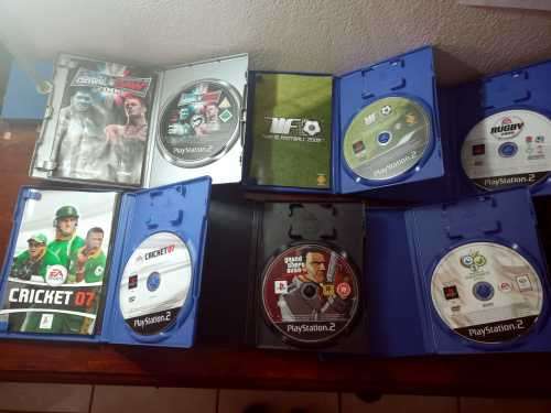 Old PS2 console with cable, manual and 9 games(not tested)