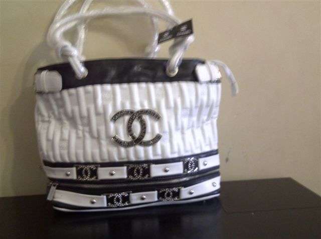 GUESS , PRADA , COCO CHANEL , AND LOUIS VUITTON