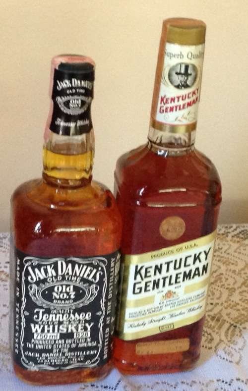 21 BOTTLES OF ASSORTED WHISKEY UP FOR GRABS . SEE PICTURES AND DESCRIPTION.