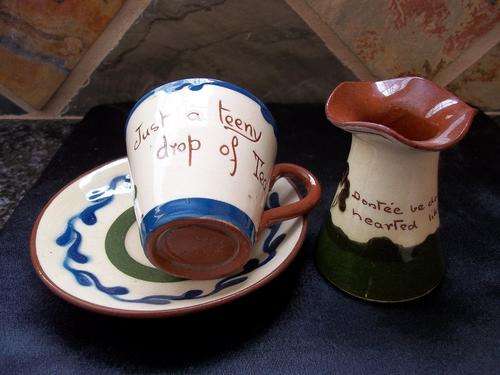 CUP AND SAUCER PLUS A SMALL VASE/JUG.