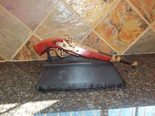 42CM REPLICA PISTOL ON STAND THIS IS DIFFERENT CIGARETTE LIGHTER.