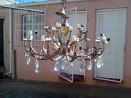 12 ARM CHANDALIER NEEDS A LOT OF WORK.