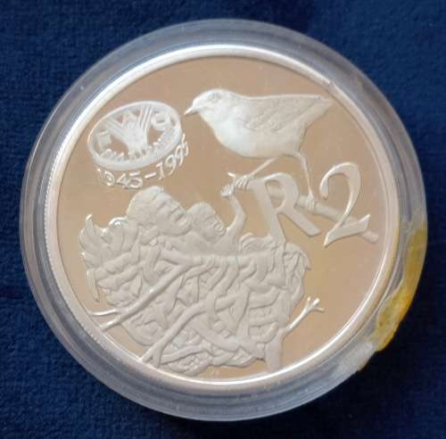 R2   1995 PROOF SILVER COIN - 8 Official Languages
