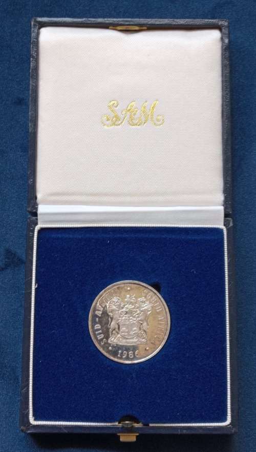 SILVER R1 PROOF COIN 1986, IN A SAM BOX WELL TONED - DIGGER