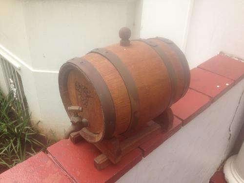 A Solid oak barrel with brass rims and solid brass tap that works