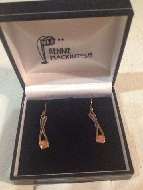 A boxed pair of enamel earrings in the Rennie Mackintosh style