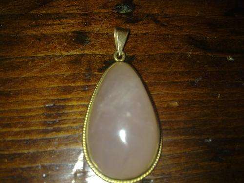 A solid gold 9ct mounted rose quartz