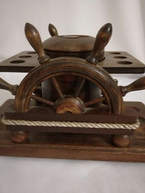 Vintage pipes and tobacco stand.