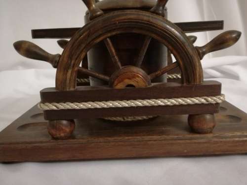 Vintage pipes and tobacco stand.