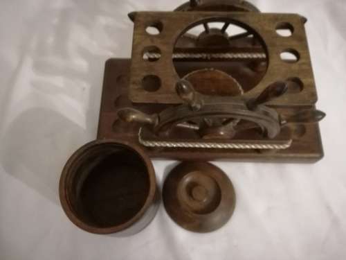 Vintage pipes and tobacco stand.