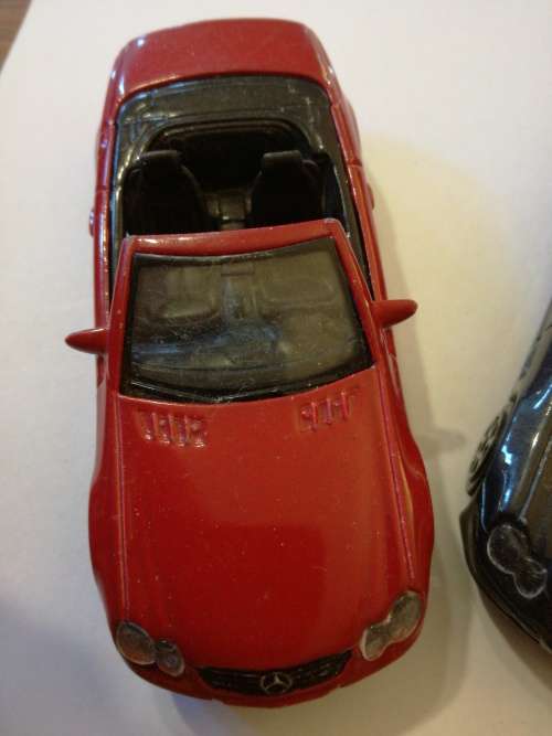 MERCEDES-BENZ SL CLASS, SCALE 1/43 one bid for both.