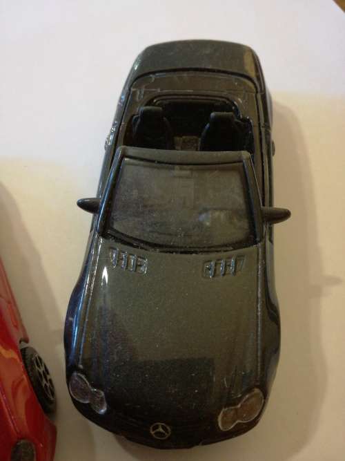 MERCEDES-BENZ SL CLASS, SCALE 1/43 one bid for both.