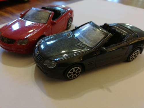 MERCEDES-BENZ SL CLASS, SCALE 1/43 one bid for both.