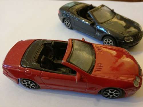 MERCEDES-BENZ SL CLASS, SCALE 1/43 one bid for both.