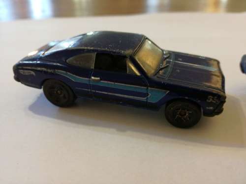 VINTAGE AMERICAN MUSCLE CARS. Chevrolet SS and 68 Dodge Dart.