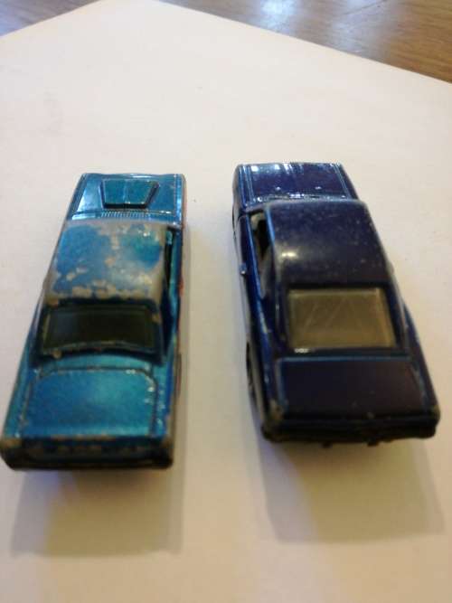 VINTAGE AMERICAN MUSCLE CARS. Chevrolet SS and 68 Dodge Dart.