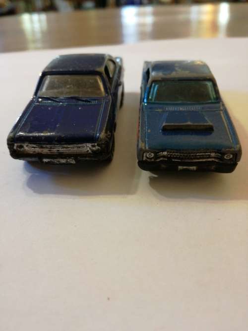 VINTAGE AMERICAN MUSCLE CARS. Chevrolet SS and 68 Dodge Dart.