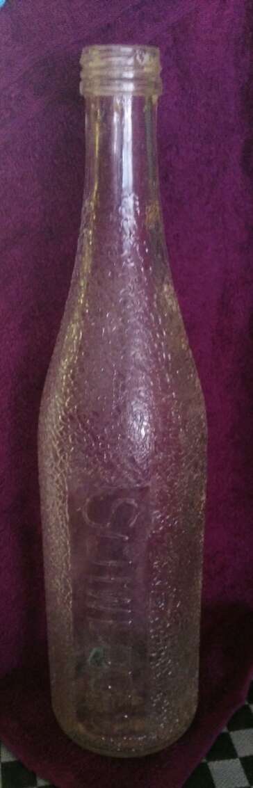 Old Schweppes Bottle