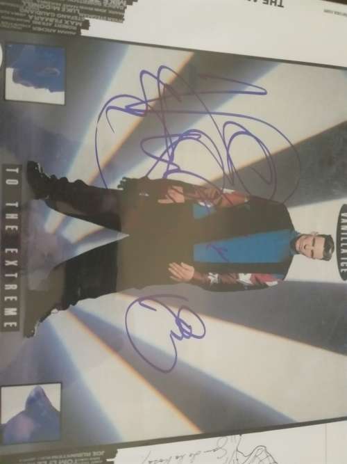 Hand signed by Vanilla Ice .