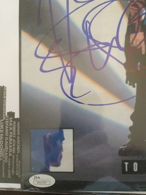 Hand signed by Vanilla Ice .