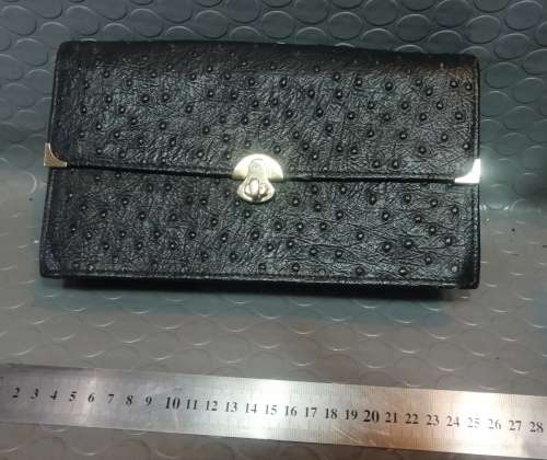 Very stylish ostrich leather handbag!!