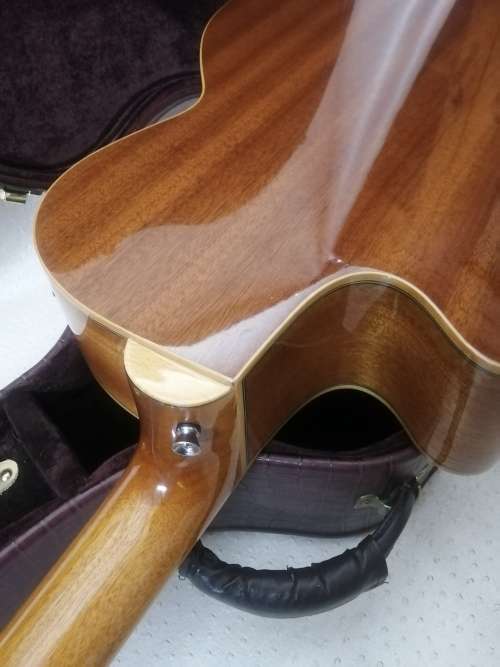 Exquisite Dreambow Electric Acoustic Guitar In a Leather Bound Temperature Controled Case