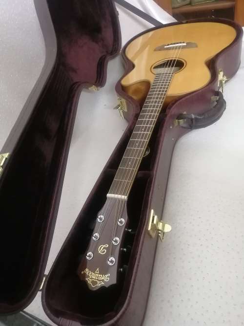 Exquisite Dreambow Electric Acoustic Guitar In a Leather Bound Temperature Controled Case