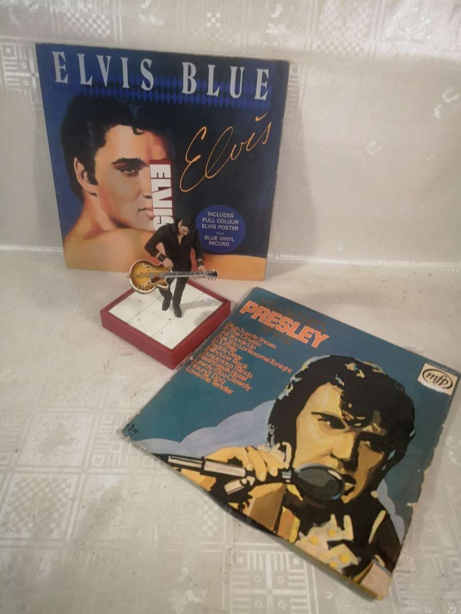 STUNNING ELVIS FIGURINE AND LP COLLECTION