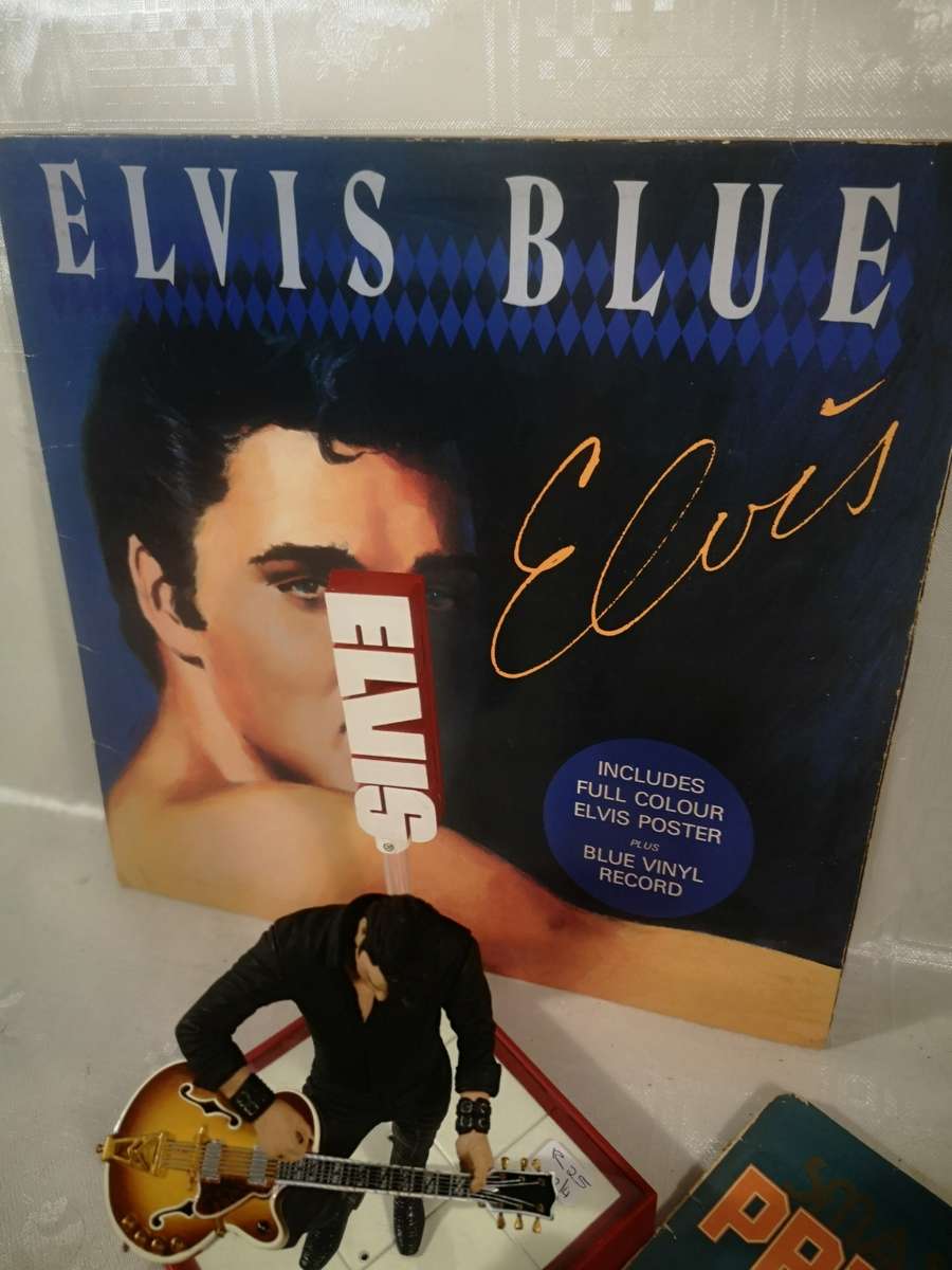 STUNNING ELVIS FIGURINE AND LP COLLECTION