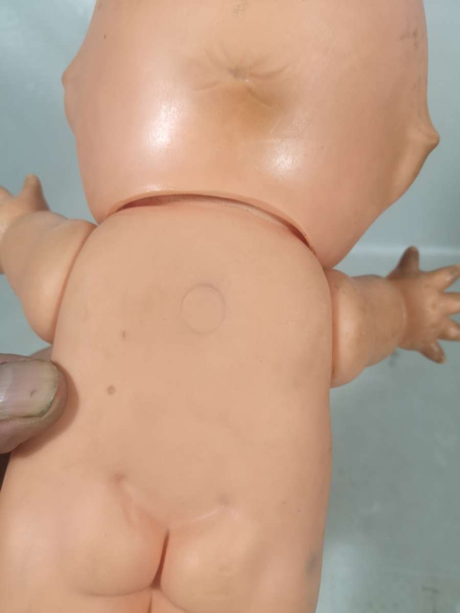 Rare Original Rubber Kewpie doll with brown eyes
