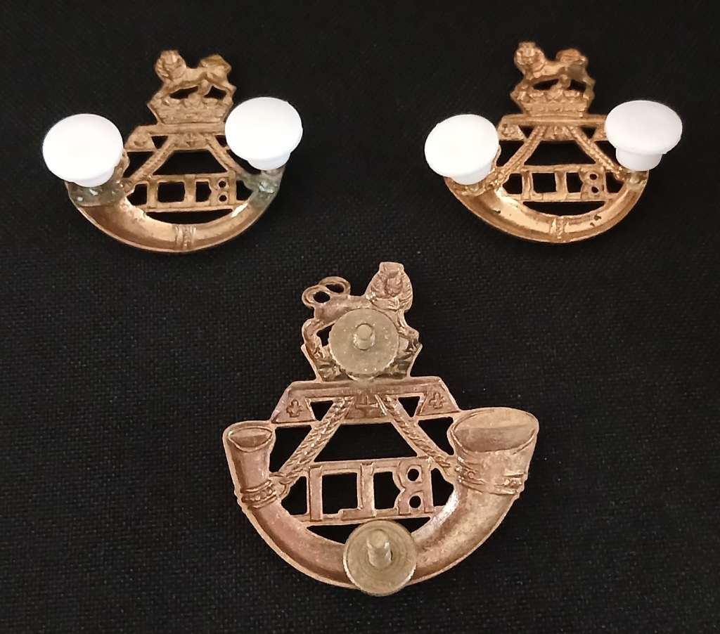 South African Rand Light Infantry Cap and Collar Badges      R81