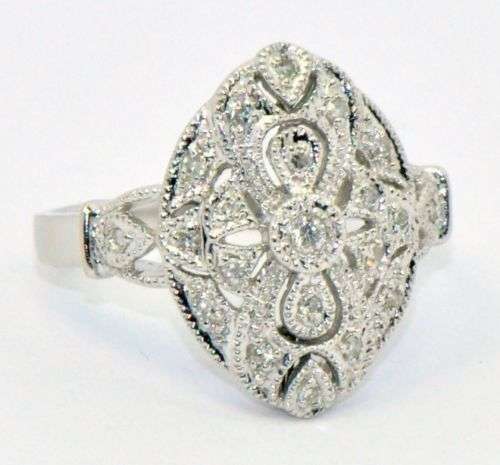 14 KT WHITE GOLD ESTATE DIAMOND RING