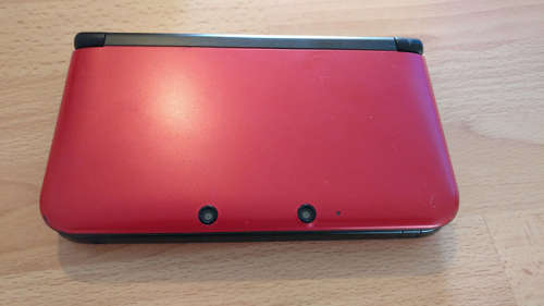Nintendo 3DS XL in box with games