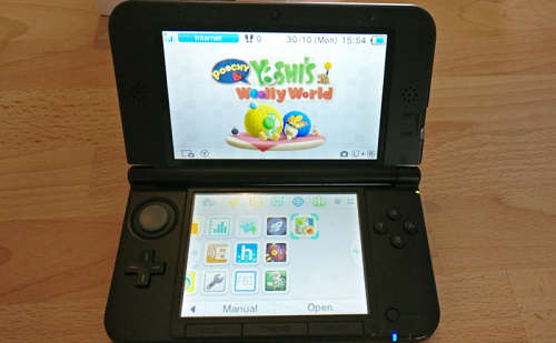 Nintendo 3DS XL in box with games