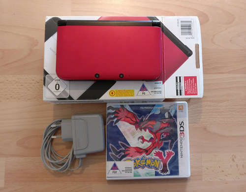 Nintendo 3DS XL in box with games