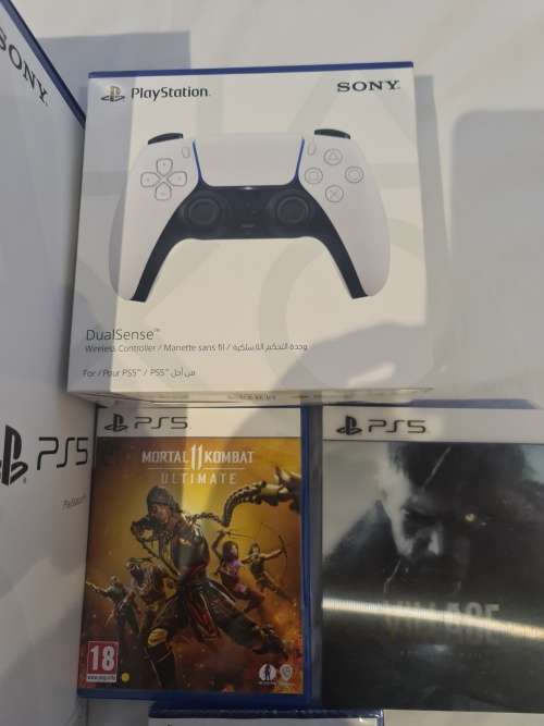 Sony Playstation PS5 Disc Version  STILL BRAND NEW 2 controllers and 3 games under warranty with pop