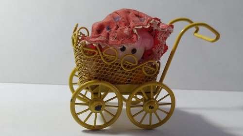 Miniature Doll in Pram