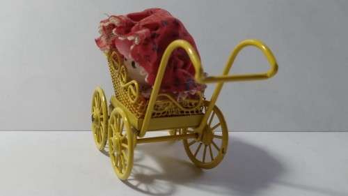 Miniature Doll in Pram