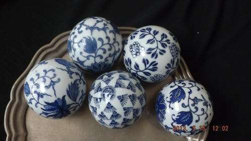Five Decorative Porcelain Balls.