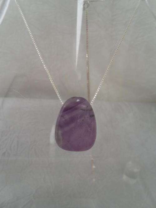 MAGNIFICENT POLISHED AMYTHYST NECKLACE WITH STERLING SILVER CHAIN.