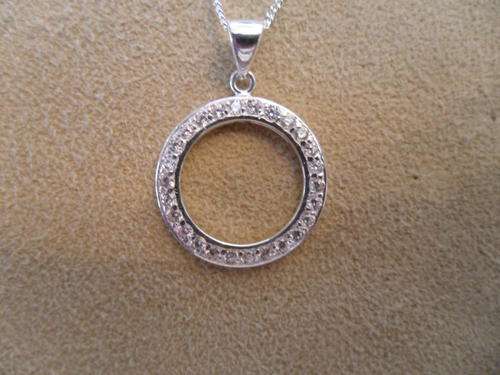BEAUTIFUL 925 STERLING SILVER AND CZ ETERINTY CIRCLE ON STERLING SILVER CHAIN.