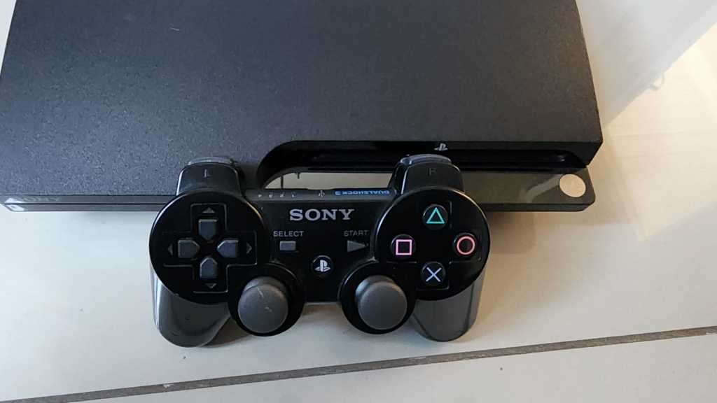 CFW, PS3 Slimline (500GB Internal Drive), 1 Controller, All Cabling, 22 Games on the HDD