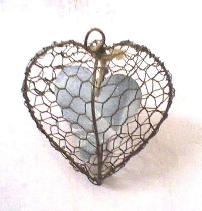 Lovely handcrafted  wire heart with wooden heart inside- absolutely stunning!