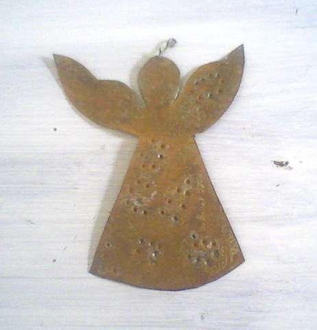Lovely handmade tin angel - beautiful on the Christmas tree.