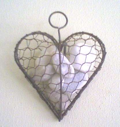 Rustic Heart filled with river stones.