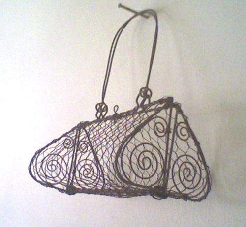 Rustic wire mesh handbags- open it up and fill with a plant, potpouri or anything funky!